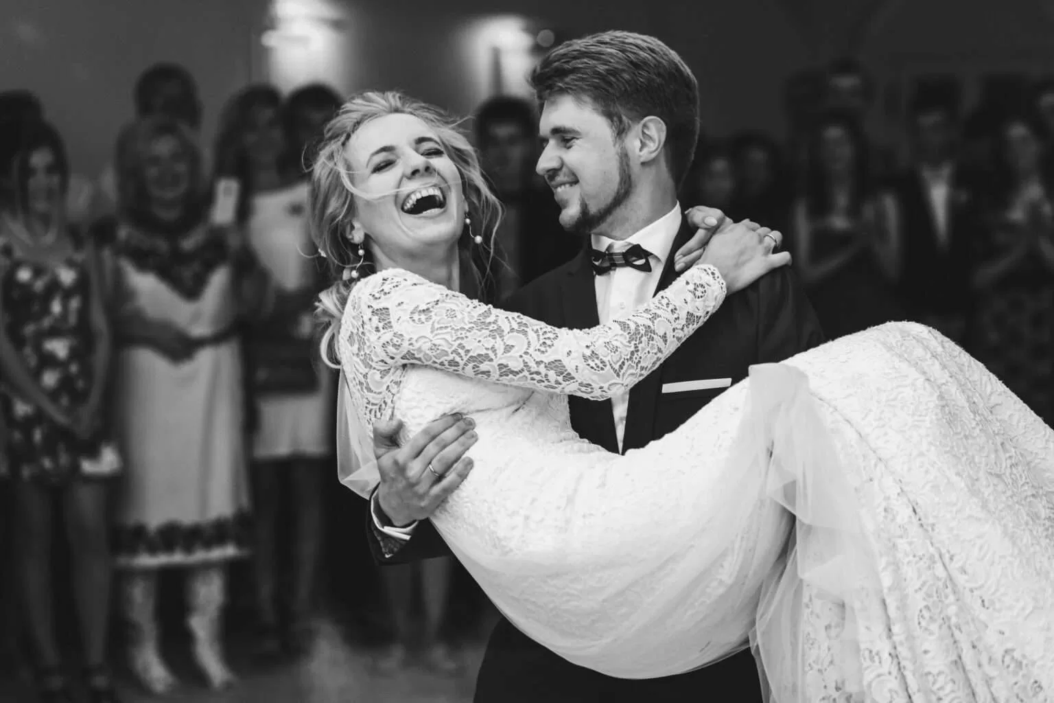 Newlyweds celebrating together on their wedding dancefloor