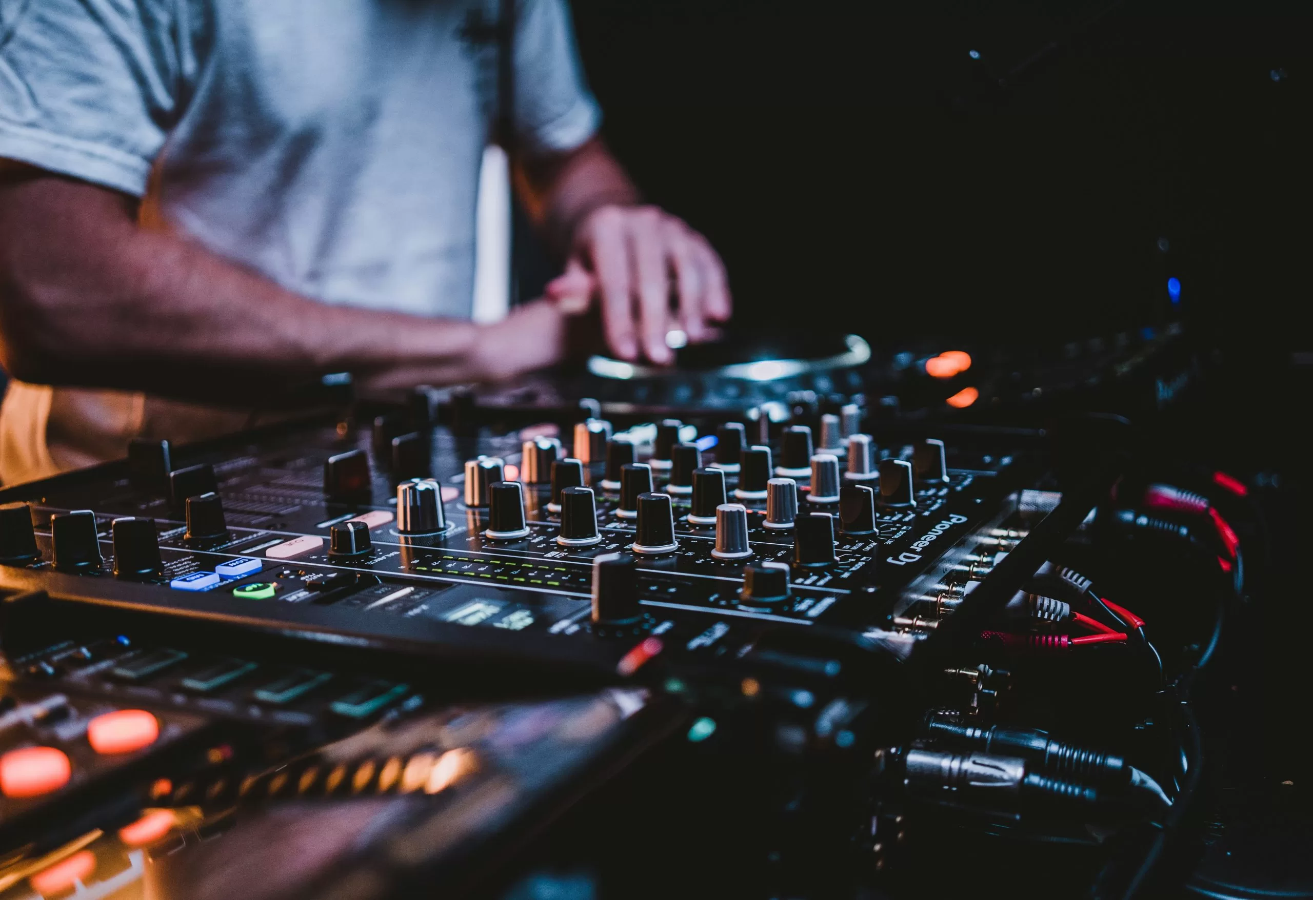 Experienced DJ performing with professional equipment