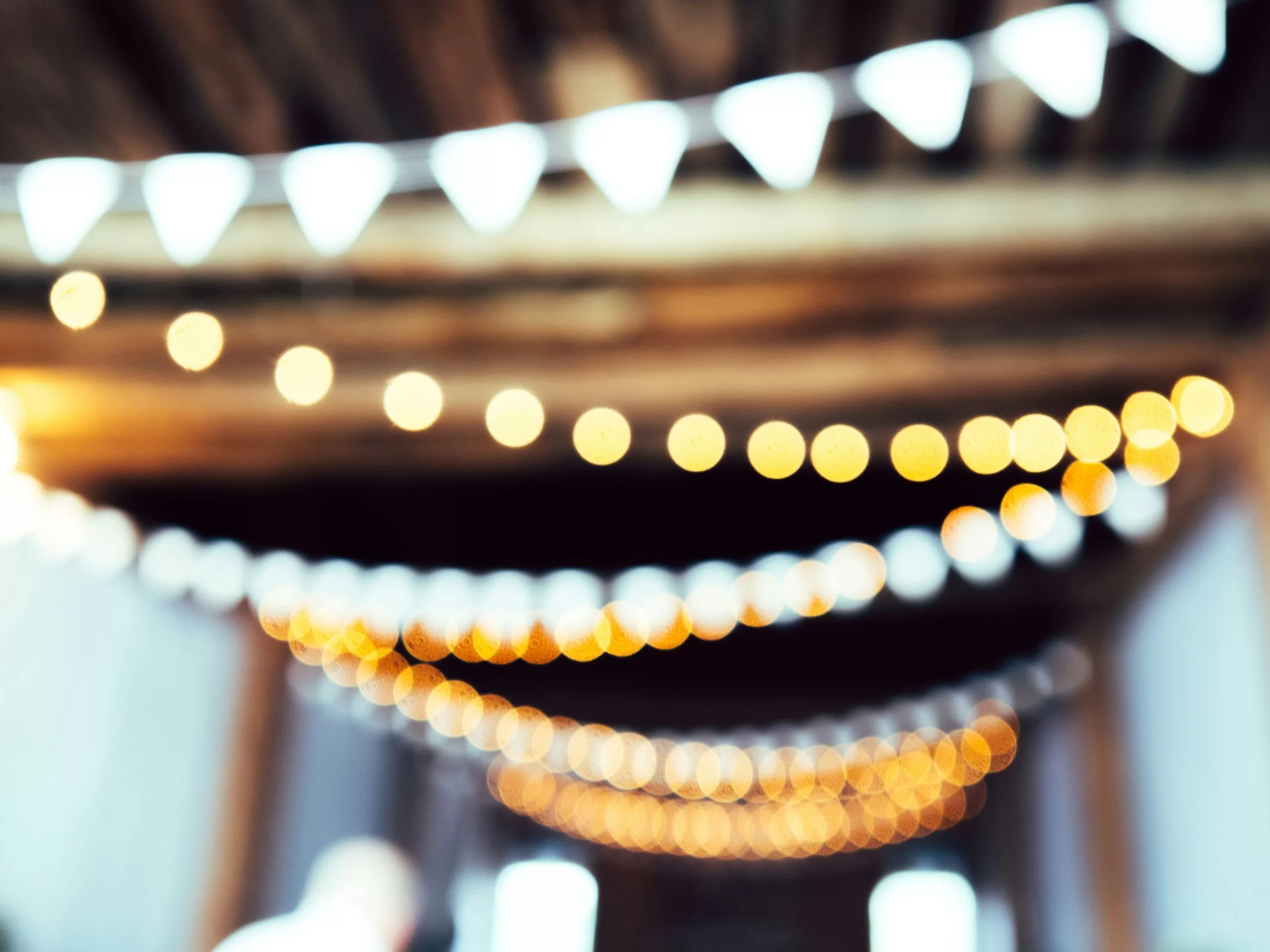 Warm event lighting creating atmosphere for a birthday party